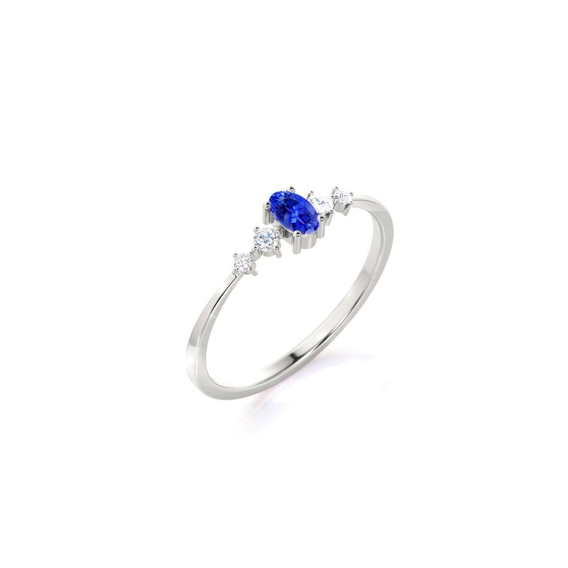 royal blue sapphire diamond ring in Platinum